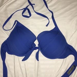 Blue halter bathing suit top with tie detail